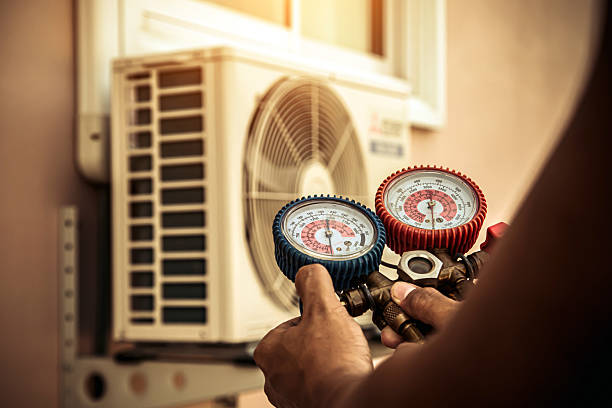 Professional Air Conditioning Service technician working in Wellington, NV